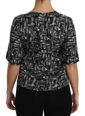 Dolce & Gabbana Schwarze Seidenbluse mit Musikinstrumenten-Druck