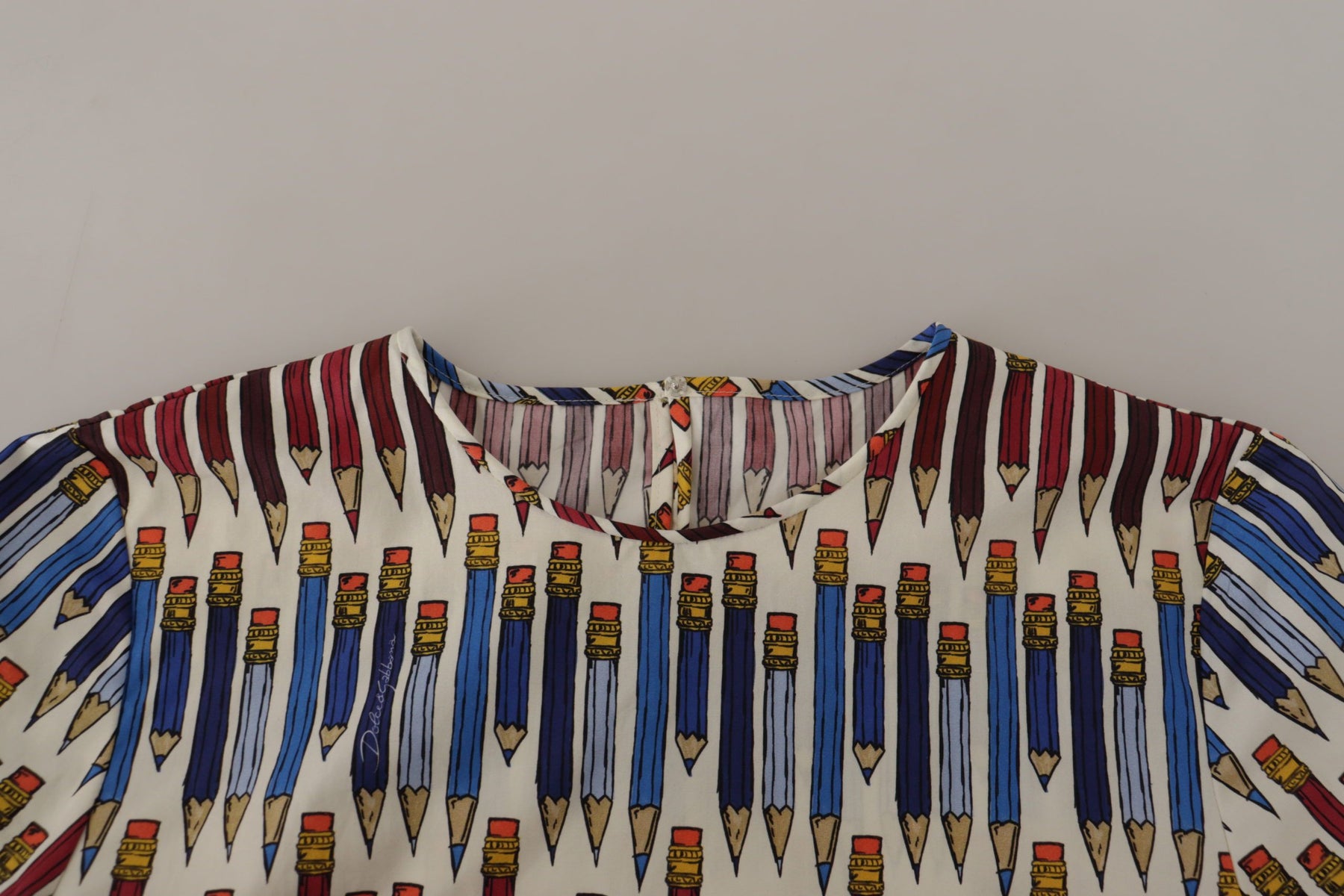 Dolce & Gabbana Weiße T-Shirt-Bluse mit Bleistiftdruck aus Baumwolle