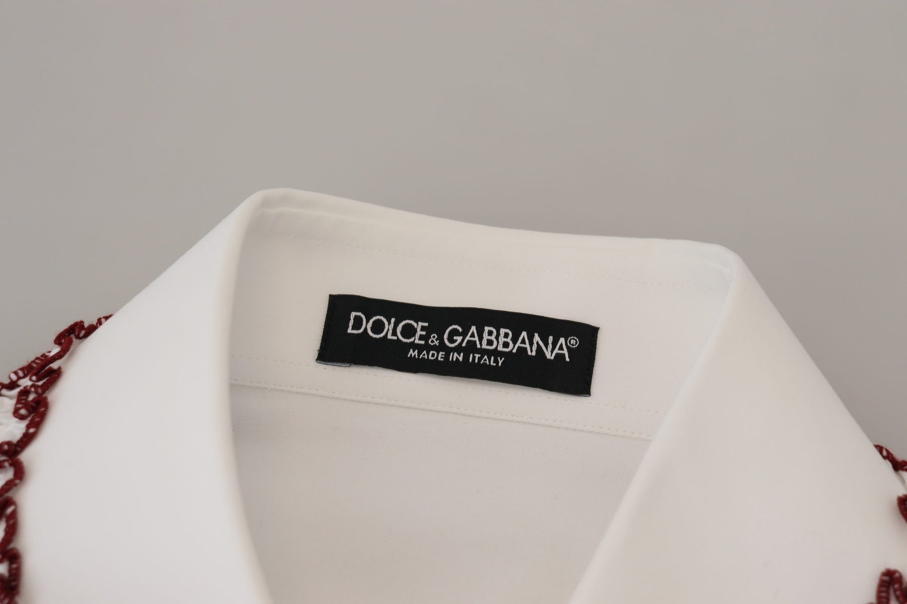 Dolce & Gabbana Weißes Spitzen-Top mit langen Ärmeln und Rüschenkragen