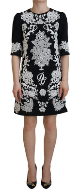 Dolce & Gabbana Schwarzes Kleid mit Spitzenbesatz und halben Ärmeln in A-Linie
