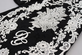 Dolce & Gabbana Schwarzes Kleid mit Spitzenbesatz und halben Ärmeln in A-Linie