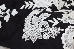 Dolce & Gabbana Schwarzes Kleid mit Spitzenbesatz und halben Ärmeln in A-Linie