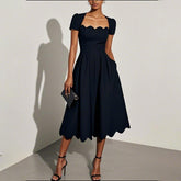 Winter Eleganz: Trendiges Midi-Kleid mit kurzen Ärmeln - Perfekt für jeden Anlass