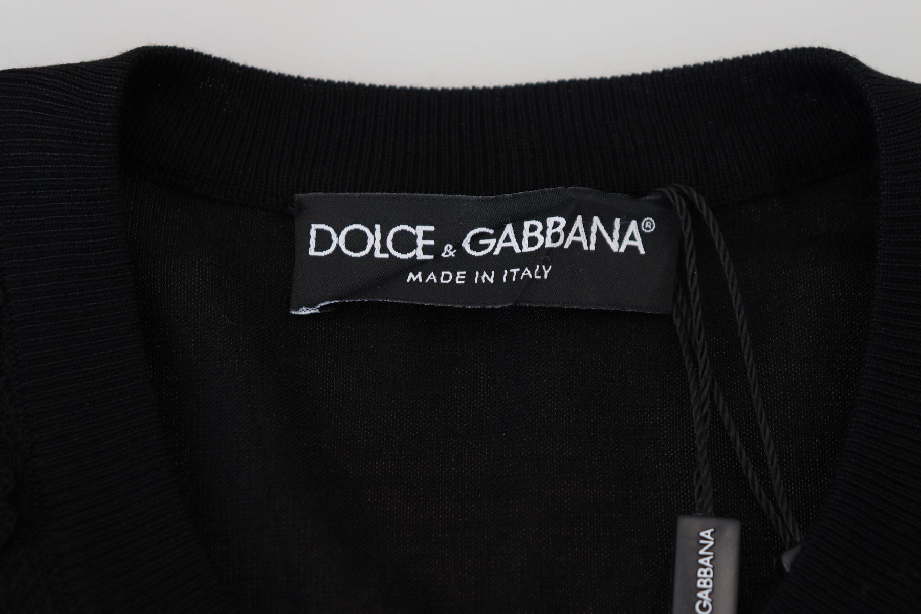 Dolce & Gabbana Schwarzer Strickpullover mit floraler Spitze und Knopfleiste