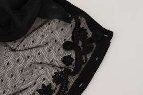 Dolce & Gabbana Schwarzer Strickpullover mit floraler Spitze und Knopfleiste