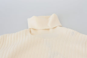 Dolce & Gabbana Elfenbeinfarbener Rollkragenpullover mit ausgefranster Manschette