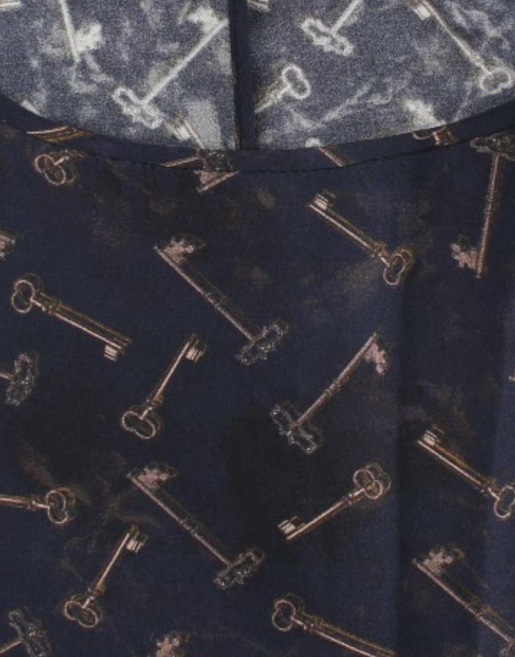 Dolce & Gabbana Blau-goldene Seidenbluse mit Schlüsseldruck