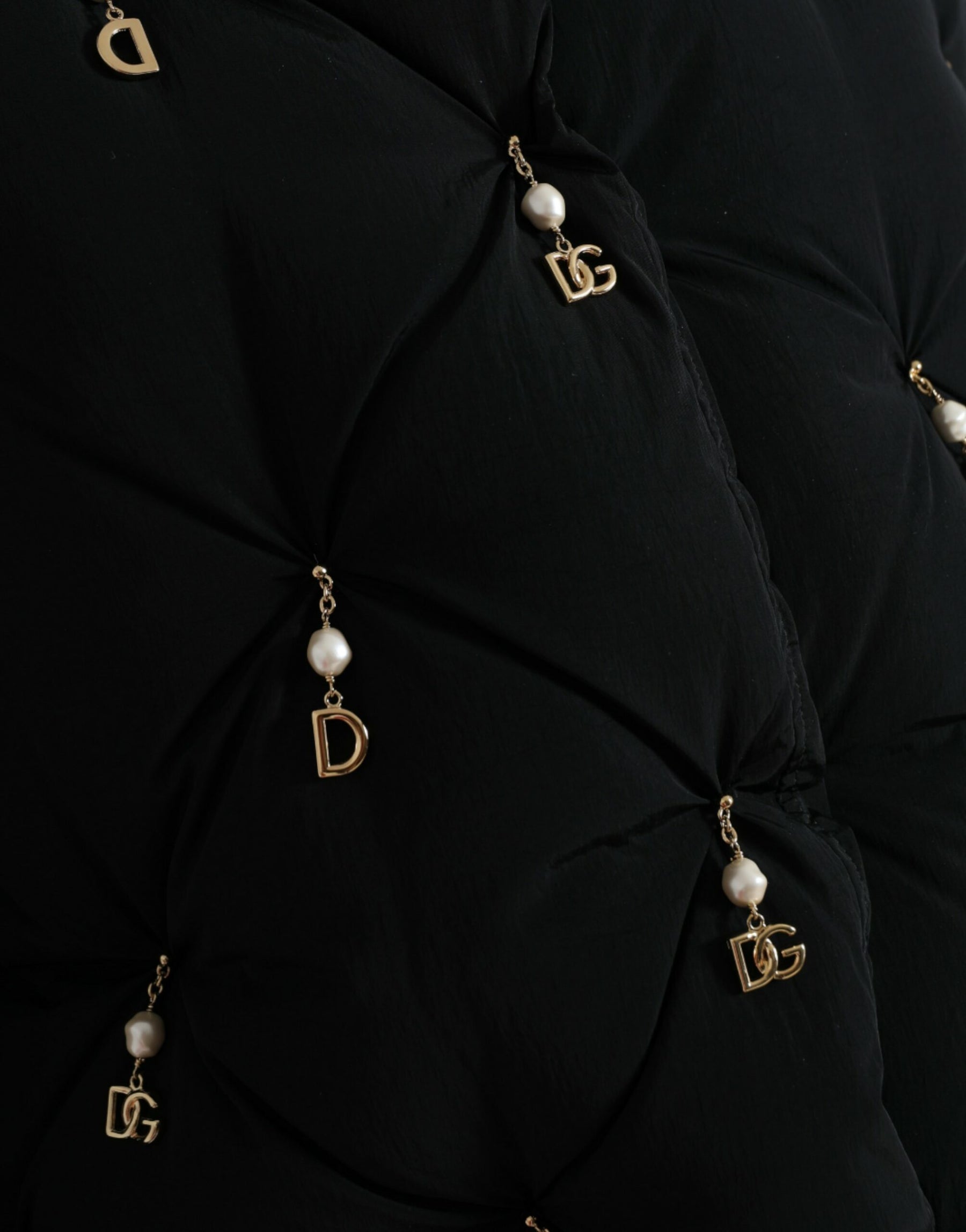 Dolce & Gabbana Schwarze Bomberjacke aus gestepptem Shell mit Verzierungen