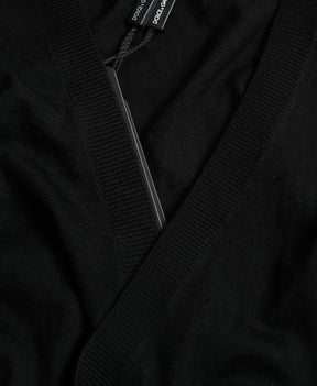 Dolce & Gabbana Schwarzer Wollpullover mit V-Ausschnitt und gekreuztem Kragen