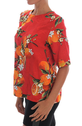 Dolce & Gabbana Orangefarbene Bluse mit Kristallverzierung