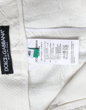 Dolce & Gabbana Weiße geblümte Brokat-Baumwoll-Cropped-Hose