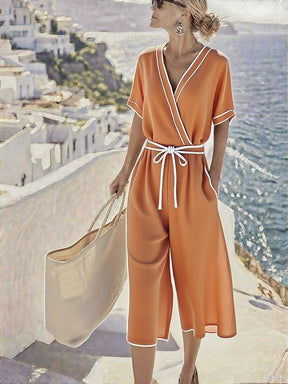 Orange Kurzarm-Jumpsuit mit V-Ausschnitt - Herbstslook mit Stil und Komfort
