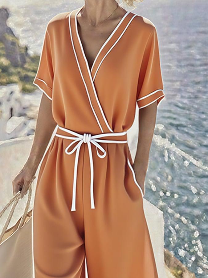Orange Kurzarm-Jumpsuit mit V-Ausschnitt - Herbstslook mit Stil und Komfort