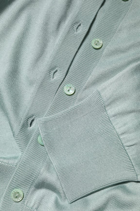 Dolce & Gabbana Hellgrüne Strickjacke aus Seide mit Knopfleiste