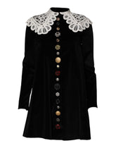 Dolce & Gabbana Schwarzes Kleid mit Spitzenkragen und Verzierungen aus Samt