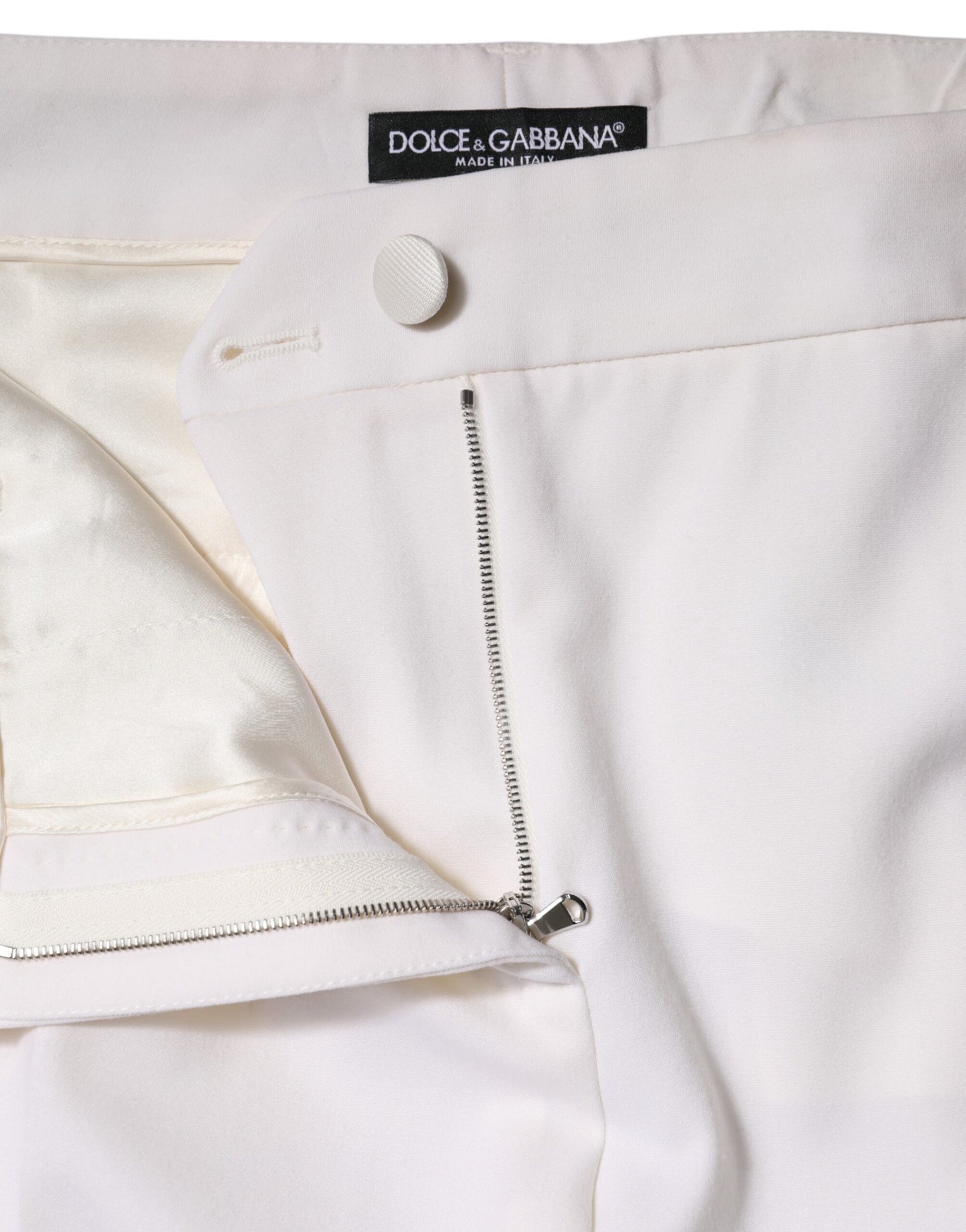 Dolce & Gabbana Weiße konisch zulaufende Hose aus Wolle mit mittlerer Taille