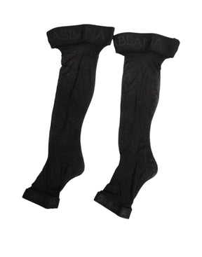 Dolce & Gabbana Schwarze Strümpfe mit transparentem Nylon-Logo-Band über dem Knie