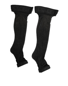 Dolce & Gabbana Schwarze Strümpfe mit transparentem Nylon-Logo-Band über dem Knie