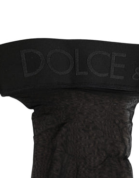 Dolce & Gabbana Schwarze Strümpfe mit transparentem Nylon-Logo-Band über dem Knie