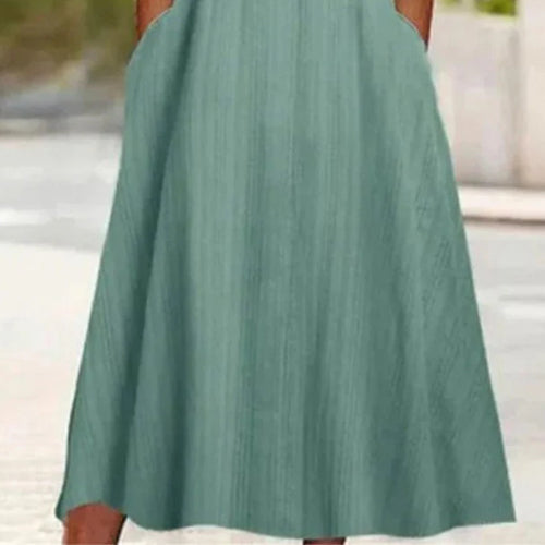 Stilvolles Midi-Kleid in Herbstsgrün mit praktischen Seitentaschen